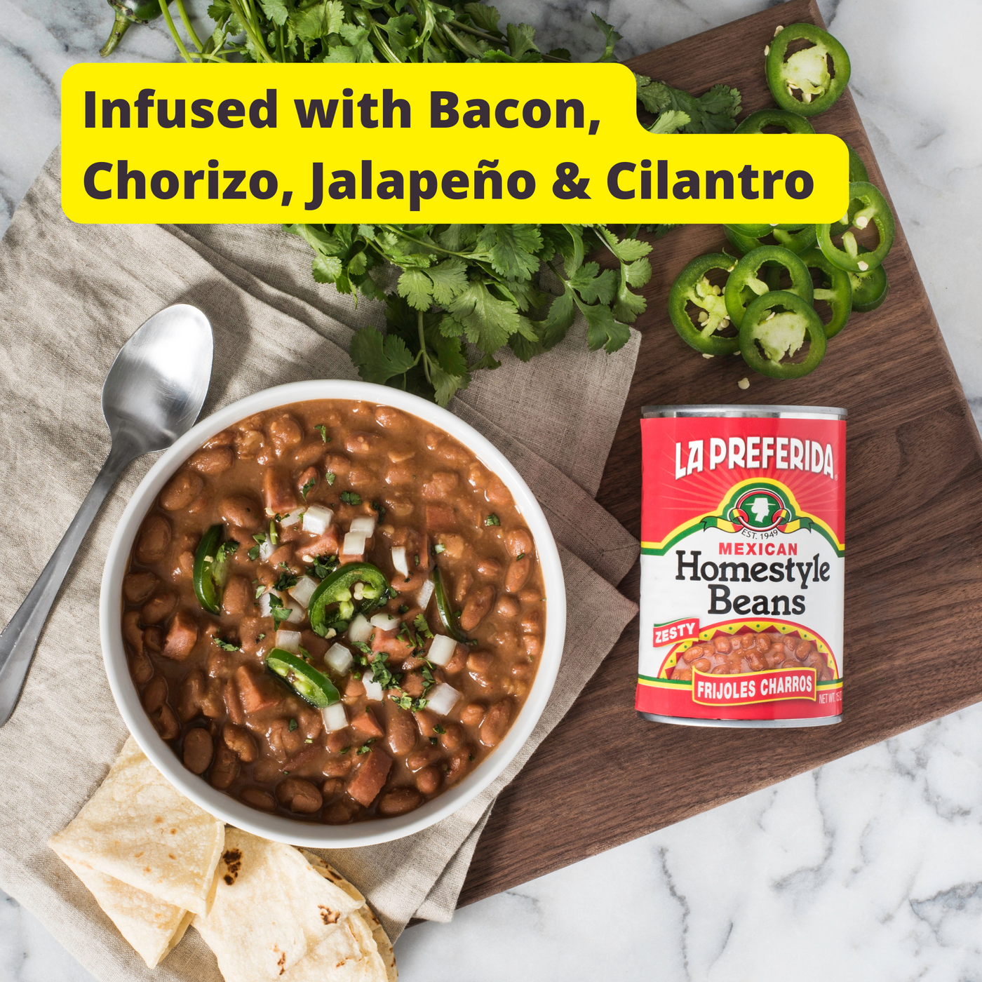 Bowl of La Preferida Homestyle Beans Frijoles Charros with jalapeño and cilantro, infused with bacon and chorizo