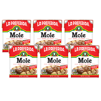 Six cartons of La Preferida Mole Oaxacan Style, convenient easy mole sauce perfect for vegan meals and traditional Oaxacan mole recipes.