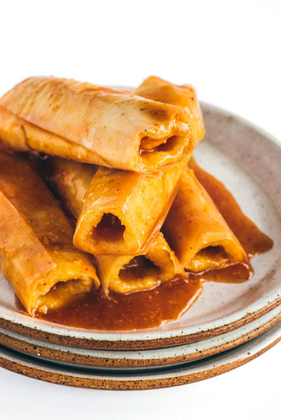 Close-up of tender beef and pork tamales served on a plate from La Preferida can